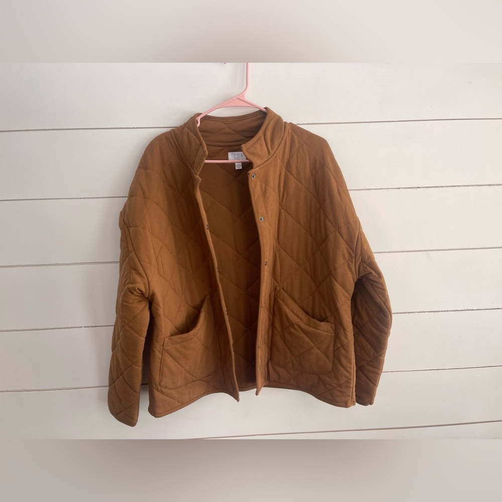 Khaki colored quilted jacket